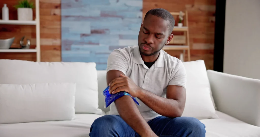 man with ice on his arm